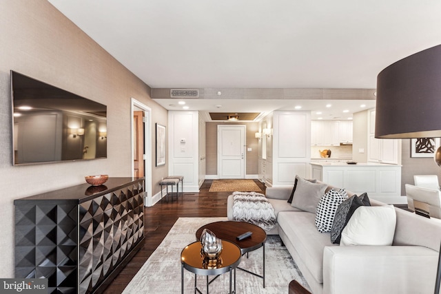 living room featuring dark hardwood / wood-style floors