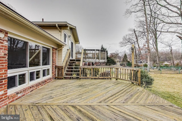 wooden deck featuring stairs