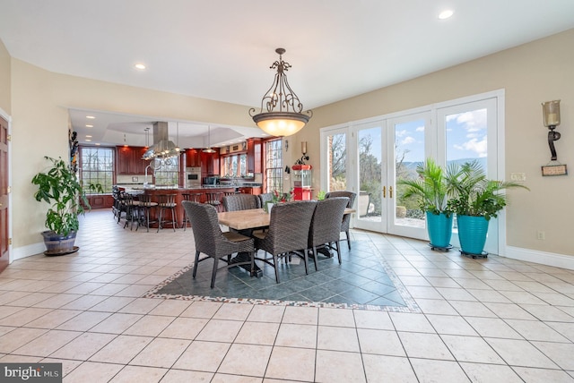 tiled dining space with french doors