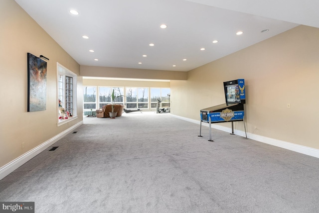 interior space featuring light colored carpet