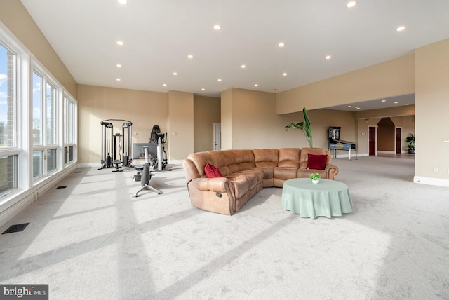 living room featuring light carpet