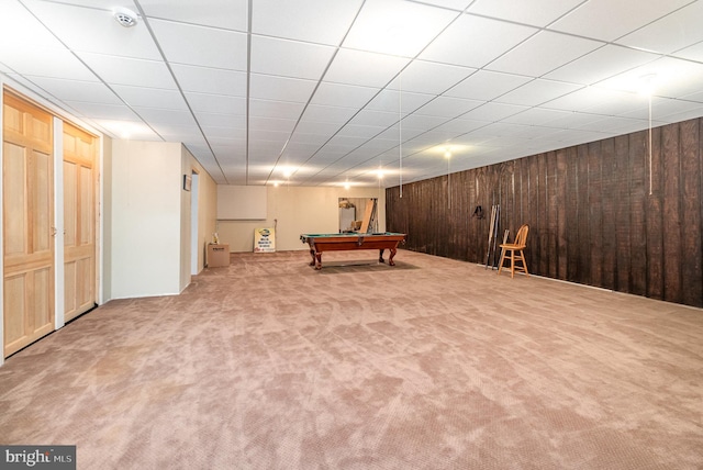 playroom with carpet, pool table, a drop ceiling, and wooden walls