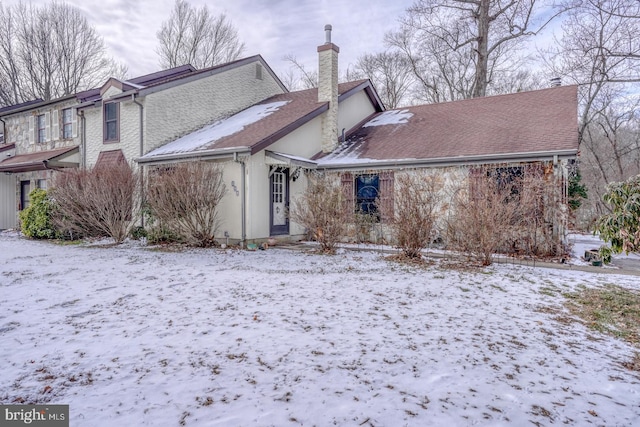 view of snow covered property