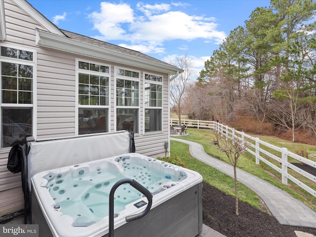 view of patio with a hot tub