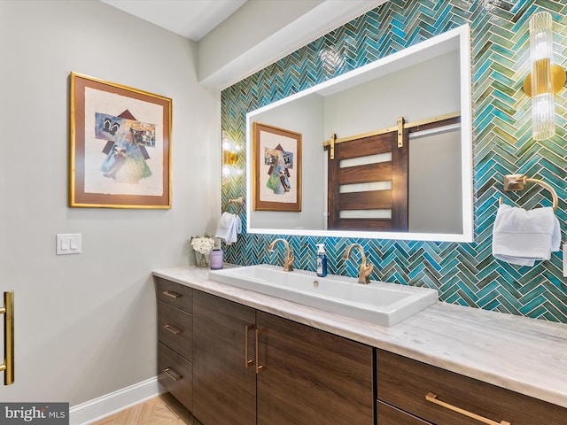 bathroom with vanity and decorative backsplash