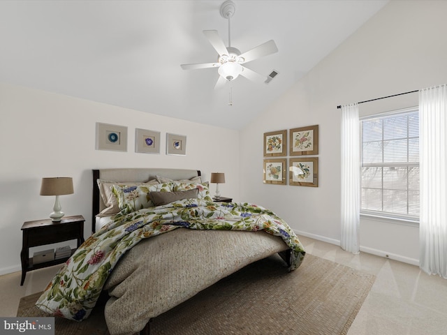 bedroom featuring high vaulted ceiling, light colored carpet, and ceiling fan