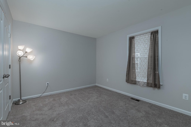 empty room with carpet floors