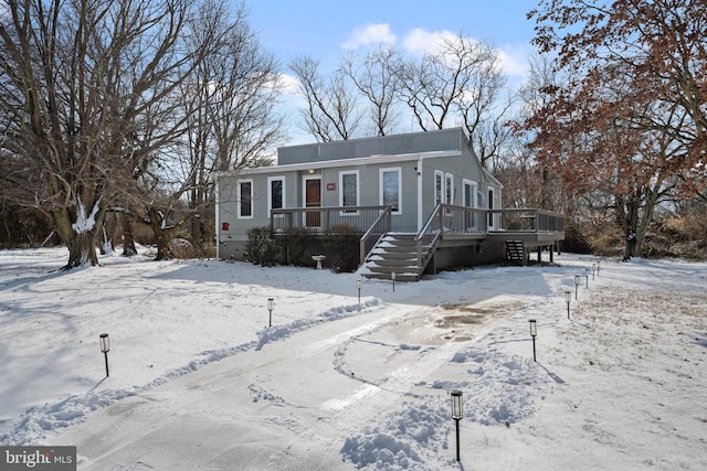 view of front of home with a wooden deck