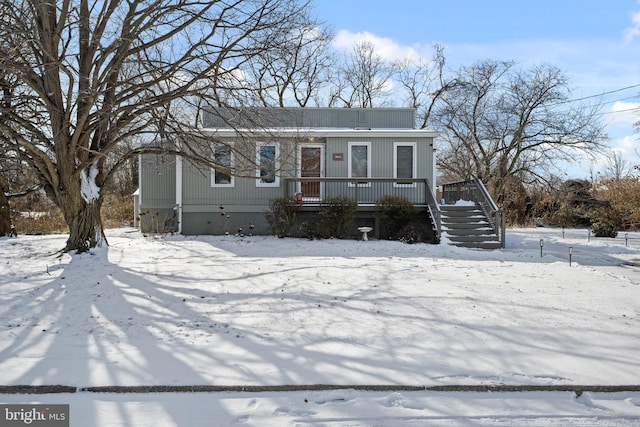 view of front of house with a wooden deck