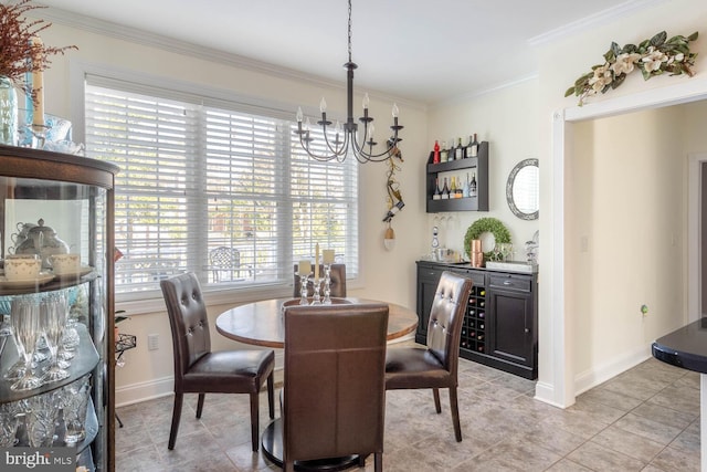 dining room with bar, crown molding, a chandelier, and light tile patterned flooring