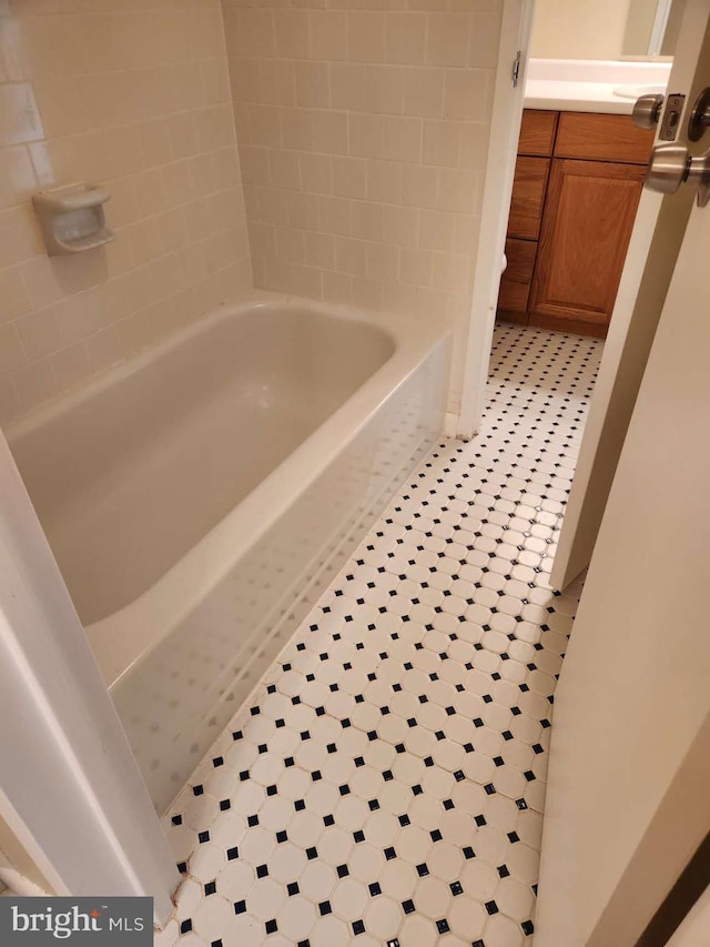 bathroom with tile patterned floors