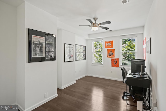 office space featuring ceiling fan and dark hardwood / wood-style floors