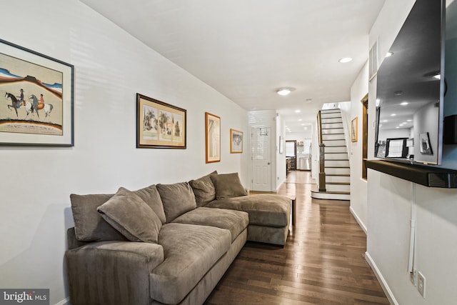 living room featuring dark hardwood / wood-style floors