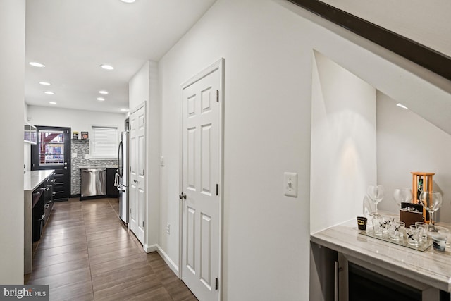 hallway featuring dark hardwood / wood-style floors