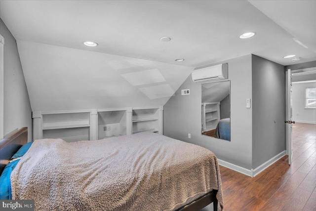 bedroom with lofted ceiling, a wall mounted AC, and dark hardwood / wood-style flooring