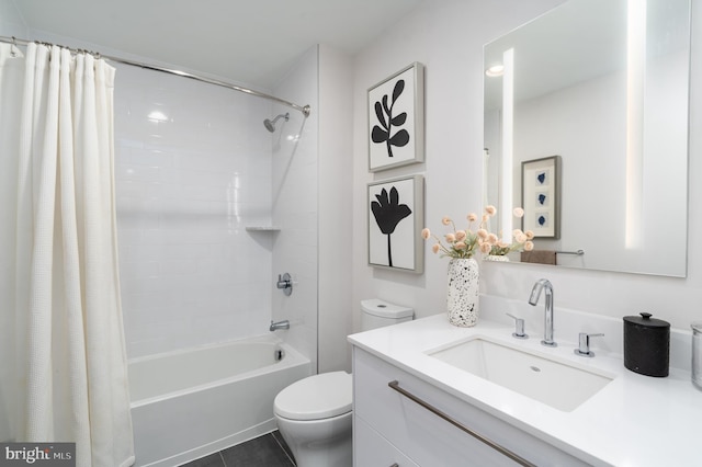 bathroom with tile patterned flooring, vanity, toilet, and shower / bath combo