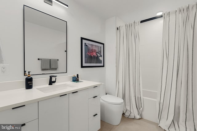 full bathroom featuring tile patterned floors, vanity, toilet, and shower / bath combination with curtain