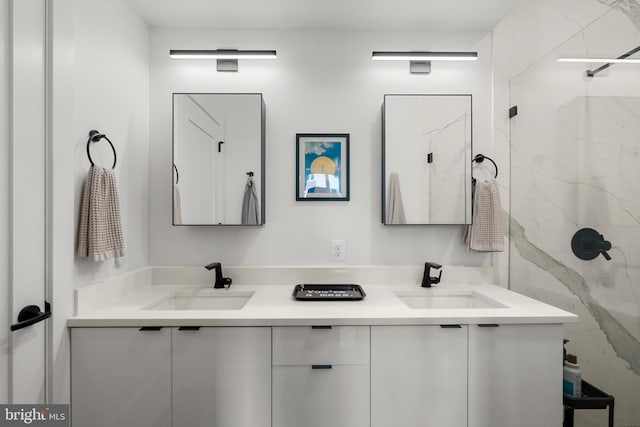 bathroom featuring vanity and a tile shower