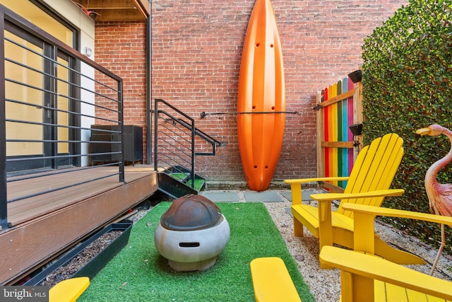 view of playground featuring a fire pit