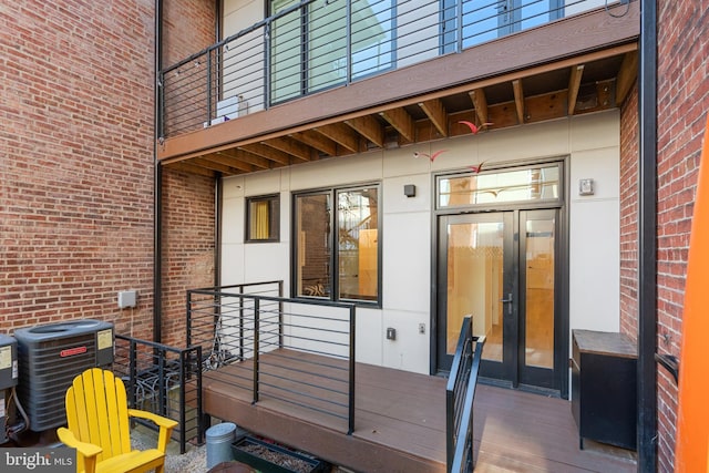 entrance to property featuring central AC unit