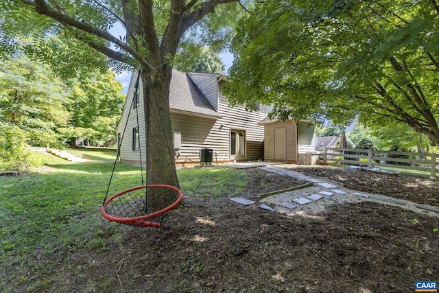 view of yard featuring central AC unit