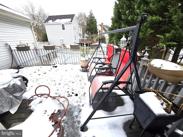 view of snow covered patio