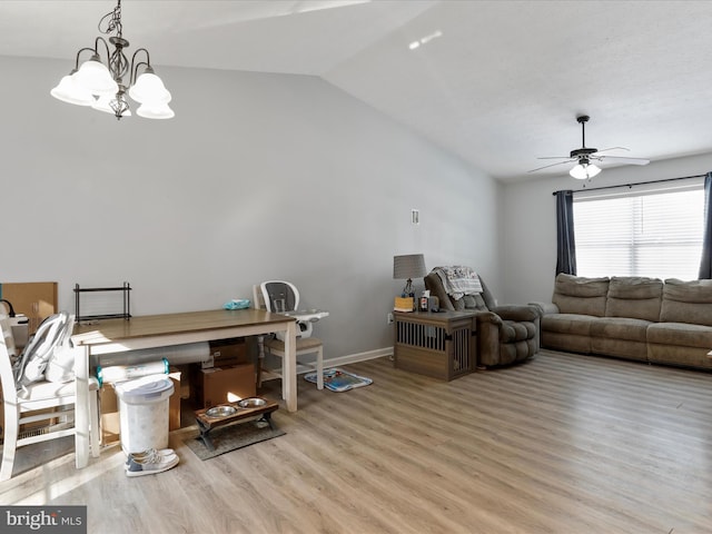 living room with vaulted ceiling, ceiling fan, and light hardwood / wood-style floors