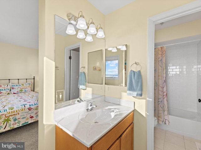 full bathroom featuring tile patterned floors, vanity, toilet, and shower / bath combo