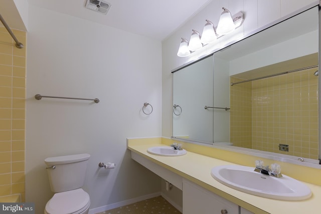 bathroom featuring sink and toilet