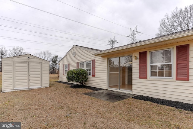 exterior space with a yard and a shed