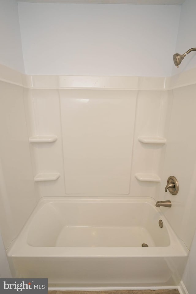 bathroom with shower / bathtub combination