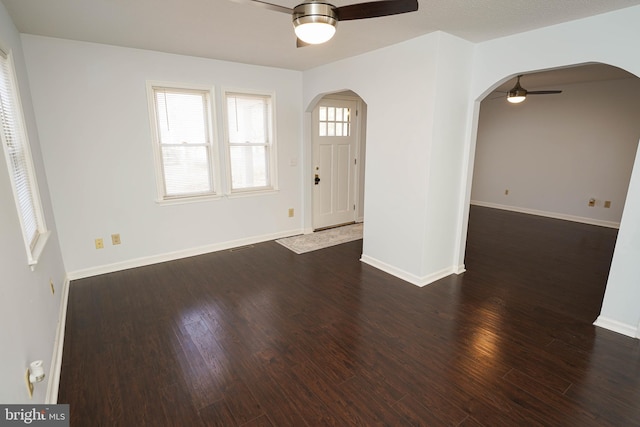 entryway featuring dark hardwood / wood-style floors and ceiling fan