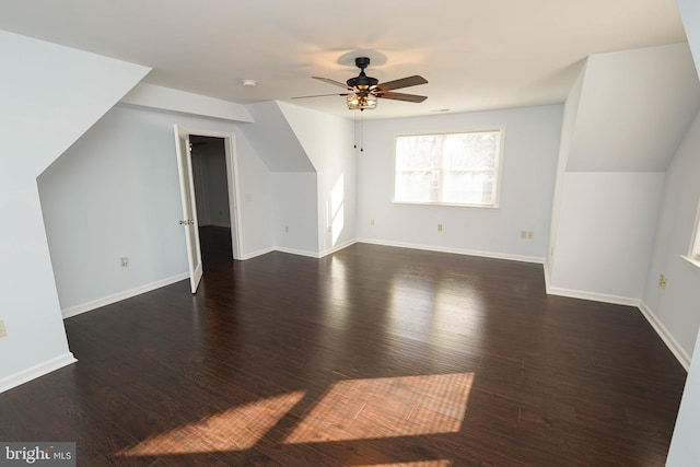 bonus room featuring dark hardwood / wood-style floors and ceiling fan