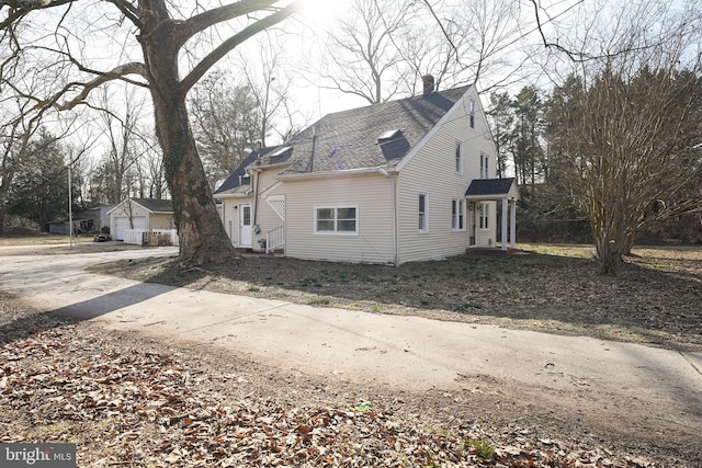 view of home's exterior with a garage