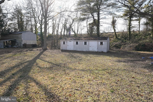 exterior space featuring a shed