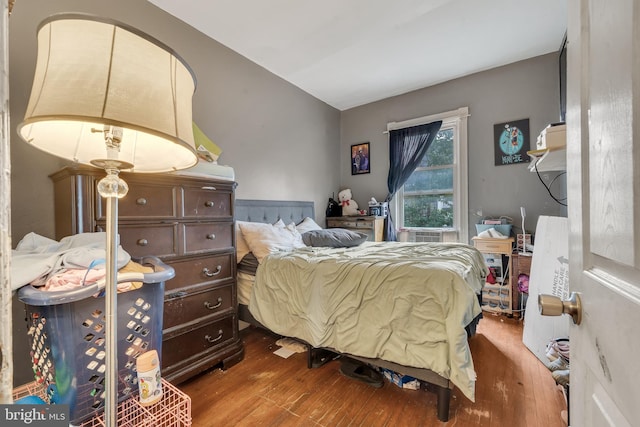 bedroom featuring wood-type flooring