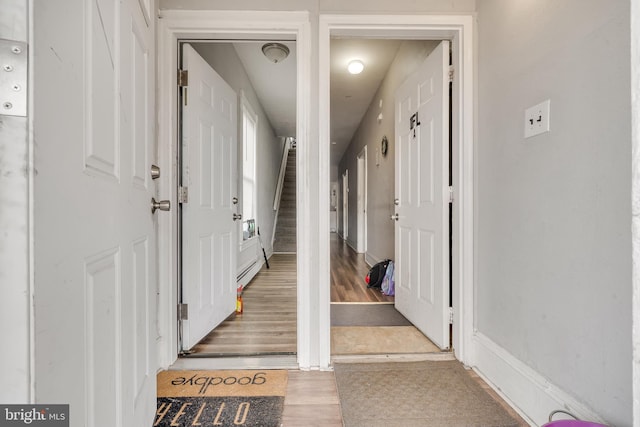 interior space featuring hardwood / wood-style flooring and baseboard heating