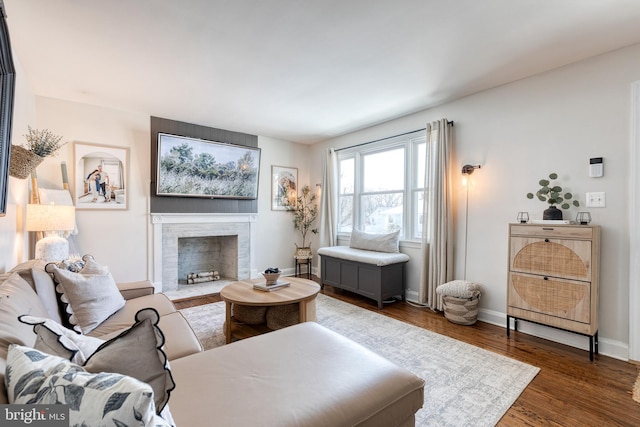 living room featuring dark wood-type flooring