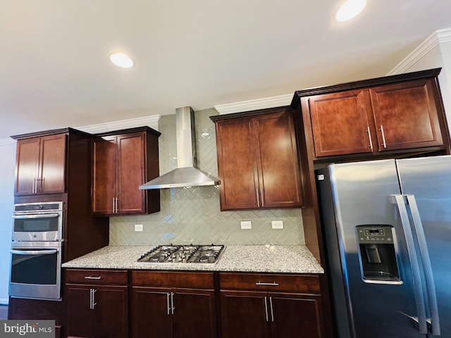 kitchen with crown molding, light stone counters, appliances with stainless steel finishes, wall chimney range hood, and backsplash