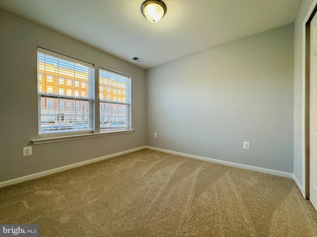 empty room with carpet floors