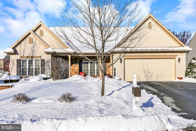 view of front of property with a garage