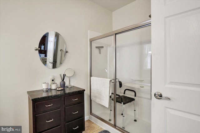 bathroom featuring tile patterned floors and walk in shower