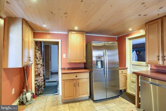 kitchen with light brown cabinetry, crown molding, stainless steel appliances, and light tile patterned flooring