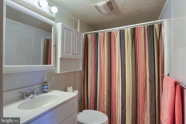 bathroom featuring crown molding, vanity, toilet, and walk in shower