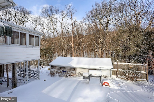 view of yard covered in snow