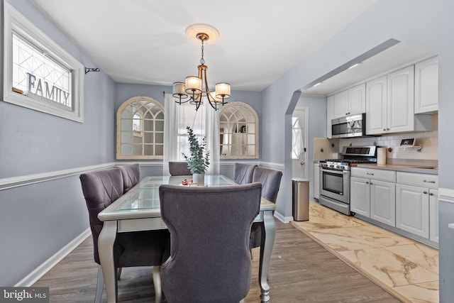 dining area with a chandelier