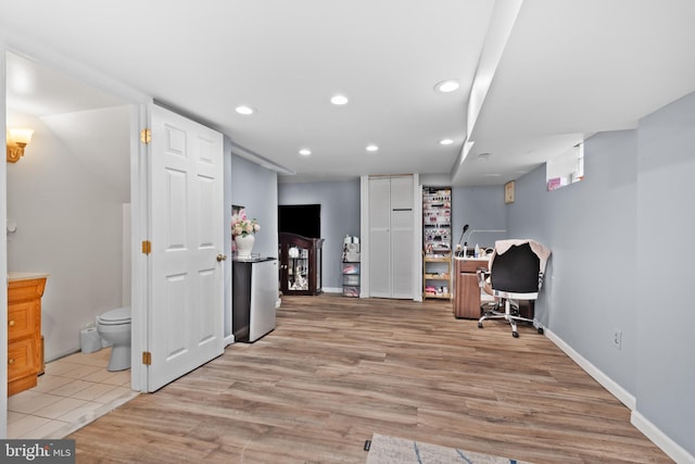 office space featuring light hardwood / wood-style floors