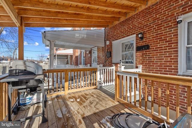 wooden terrace with a pergola