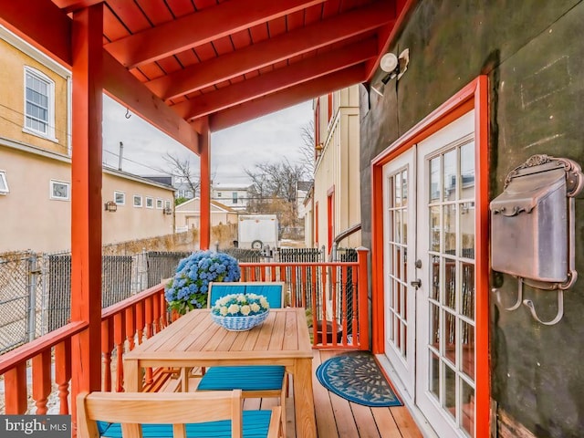 wooden deck featuring french doors