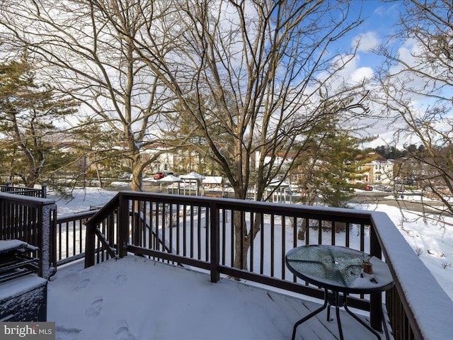 view of snow covered deck